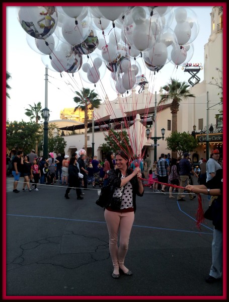 Holding the Disneyland Balloons